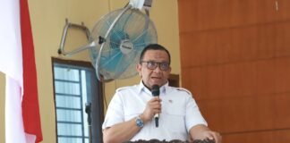 BPJPH Gelar Sosialisasi Sertifikasi Halal untuk Pelaku Usaha di Sumut Wakil Kepala BPJPH Afriansyah Noor saat menyampaikan materi tentang sertifikasi halal untuk pelaku usaha di acara sosialisasi di Kwala Bingai, Sumatera Utara.