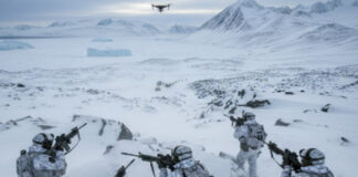 Foto hasil olahan Akal Imitasi (AI) Google Gemini dengan Prompt dari Tajuk Nasional menampilkan Militer Denmark dibantu Prancis dan Jerman menjaga wilayah Greenland dari ancaman invasi Amerika Serikat, Kamis (15/1/2026). NATO retak dari dalam usai Donald Trump klaim bakal rebut Greenland dari Denmark.