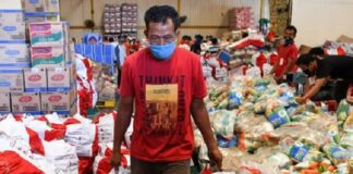 Penyaluran bantuan sosial kepada Keluarga Penerima Manfaat (KPM) melalui program PKH dan BPNT tahun 2026.