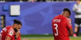 Pemain Yordania tertunduk usai kalah dari Aljazair pada laga Grup J Piala Dunia 2026. Kekalahan tersebut memastikan langkah Yordania terhenti di fase grup.