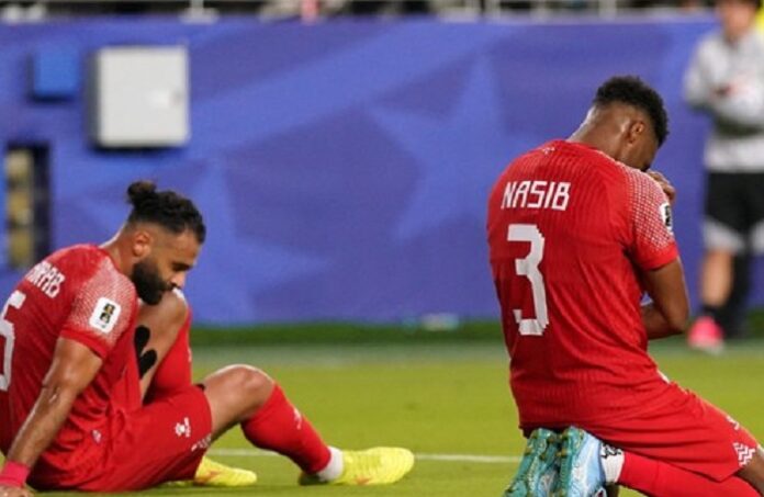 Pemain Yordania tertunduk usai kalah dari Aljazair pada laga Grup J Piala Dunia 2026. Kekalahan tersebut memastikan langkah Yordania terhenti di fase grup.