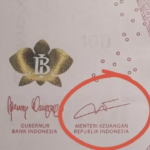 Uang pecahan Rp100 ribu TE 2022 Tahun Cetak 2026 memuat tanda tangan Purbaya Yudhi Sadewa dan Perry Warjiyo.